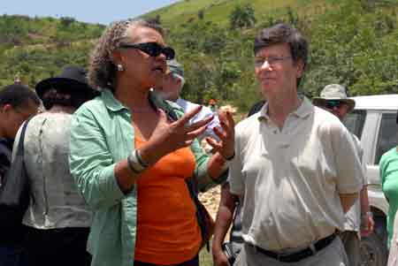 Lead agronomist Florence Sergile describes the potential and the challenges of the land around Marmont with Earth Institute Director Jeffrey Sachs as they look upon the panoramic view from Morne Sourit. Photo by Jennifer Browning.